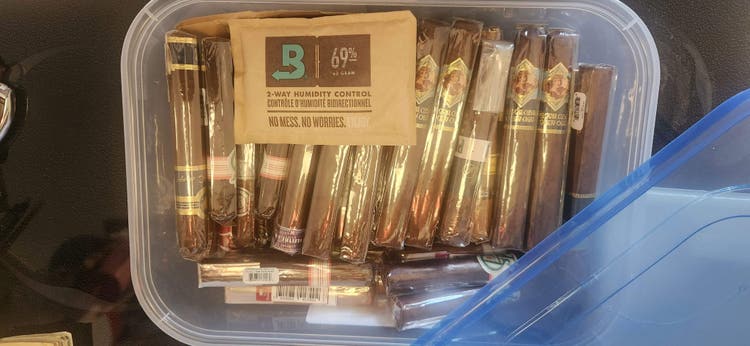 cigar advisor storing cigars without a humidor 3-10-23-tupperware at famous smoke shop