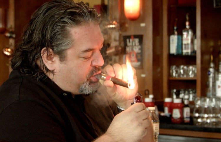 cigar advisor 5 most common burn issues - john pullo lighting a cigar