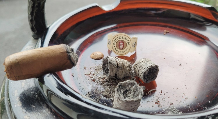 Alec Bradley Occidental Reserve Connecticut wrapper Robusto cigar cigar in ashtray