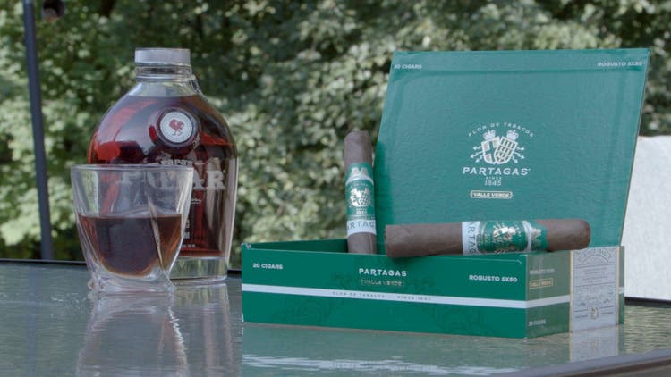 cigar advisor my weekend cigar review partagas valle verde - setup shot of the cigars and their box with whiskey in the background