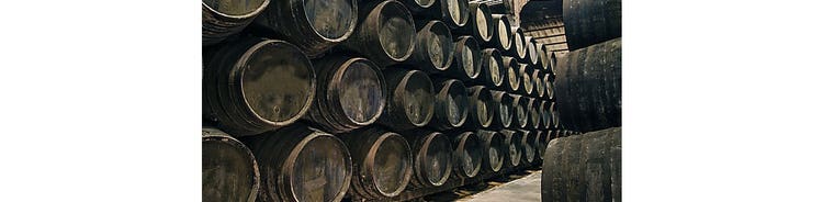 whiskey and cigars aged in barrels
