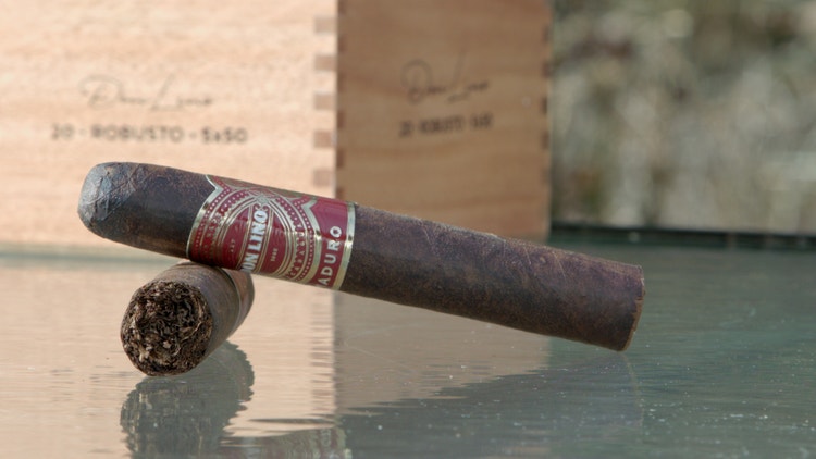cigar advisor #nowsmoking cigar review don lino maduro setup shot of cigars and box on glass table