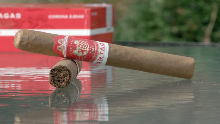 cigar advisor #nowsmoking cigar review partagas cortado corona cigars stacked with box in the background