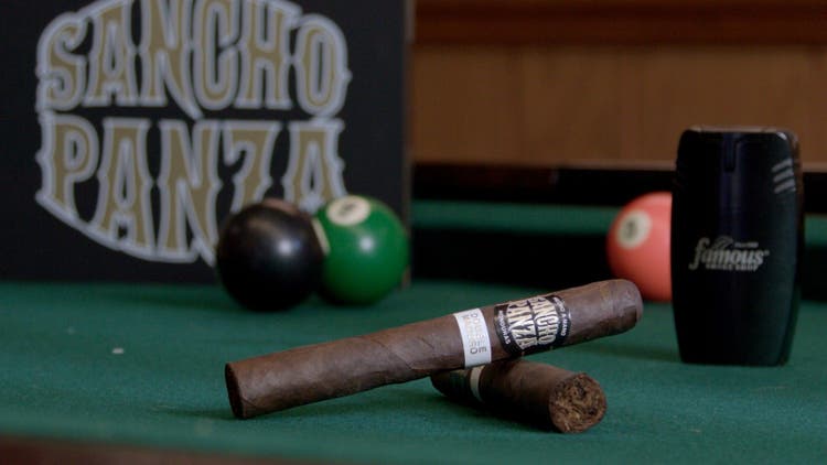 cigar advisor #nowsmoking cigar review sancho panza double maduro - setup shot of cigars on a pool table with lighter, box, and billiard balls in the background