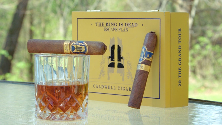 cigar advisor #nowsmoking cigar review of caldwell the king is dead the grand tour - setup shot of cigars with box and whiskey glass
