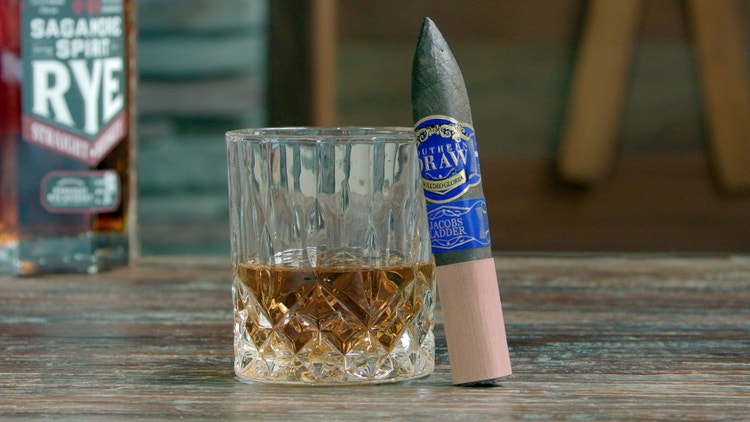 cigar advisor #nowsmoking cigar review southern draw jacobs ladder ascension cigar leaning on whiskey glass