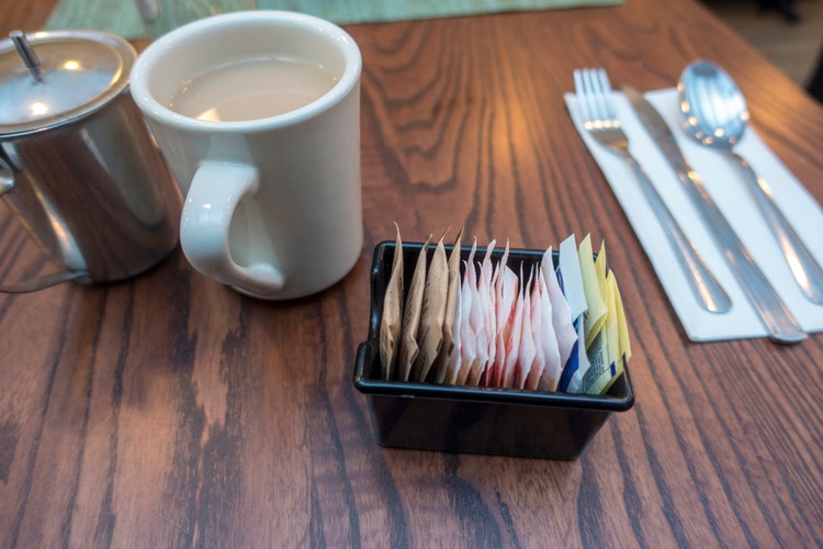 cigar advisor cigar nausea nic sick fix - sugar packets on a diner table