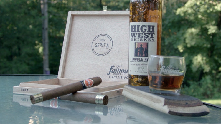 #nowsmoking cigar advisor review hvc serie a exclusivo setup shot with cigars, the box, and whiskey