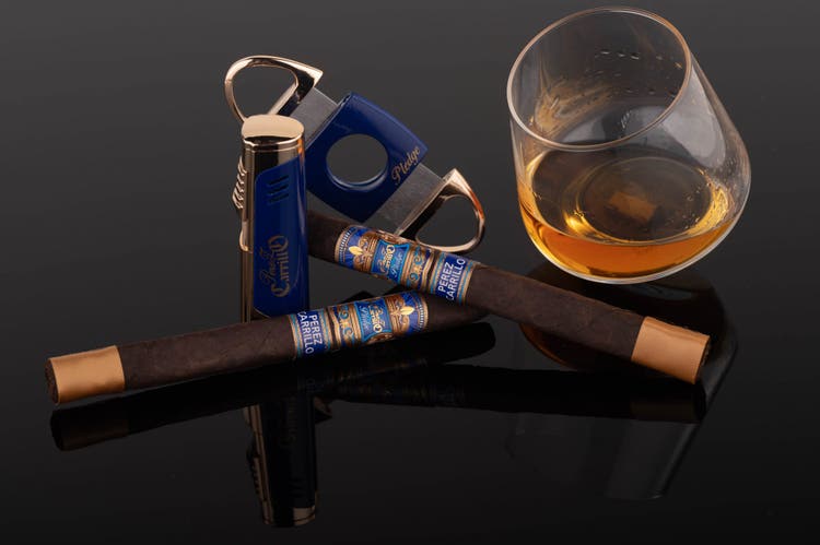 cigar-advisor-news-epc-plesge-lonsdale-limitada-press-release-photo-of-cigars-whiskey-glass-cutter-lighter