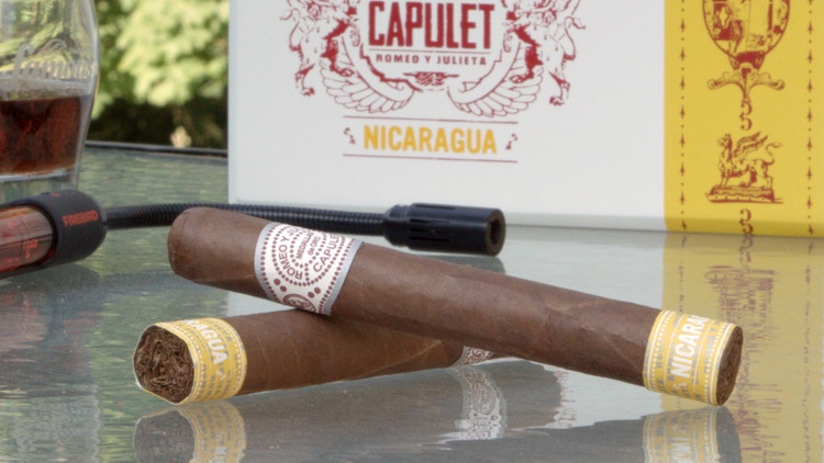 cigar advisor panel review romeo y julieta house of capulet nicaragua - setup shot of cigars on a table with box in the background