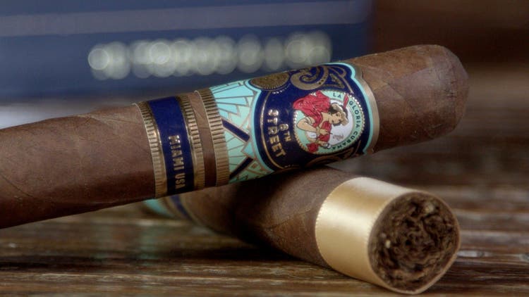 cigar advisor #nowsmoking cigar review la gloria cubana 8th street setup shot of two cigars