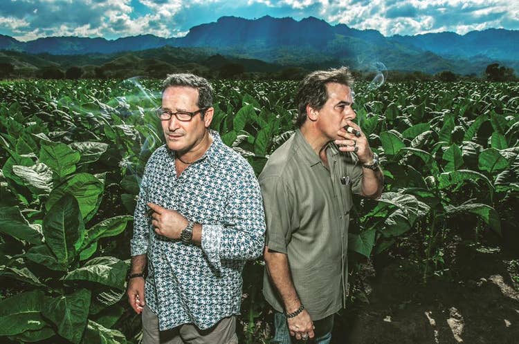 alec bradley's alan rubin and ralph montero in front of a tobacco field
