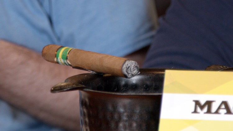 Jared's Macanudo Inspirado Brazilian Shade cigar on an ashtray