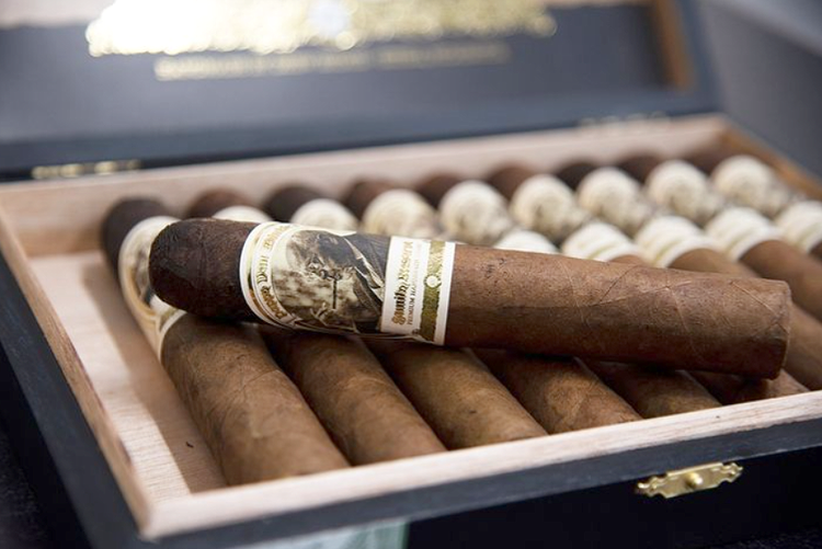 cigar advisor news - pappy van winkle barrel fermented gordo release - gordo cigar shown resting on top of its open box