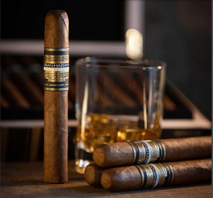 cigar advisor news - gran habano 20th anversario cigars release -cigars and glass of scotch