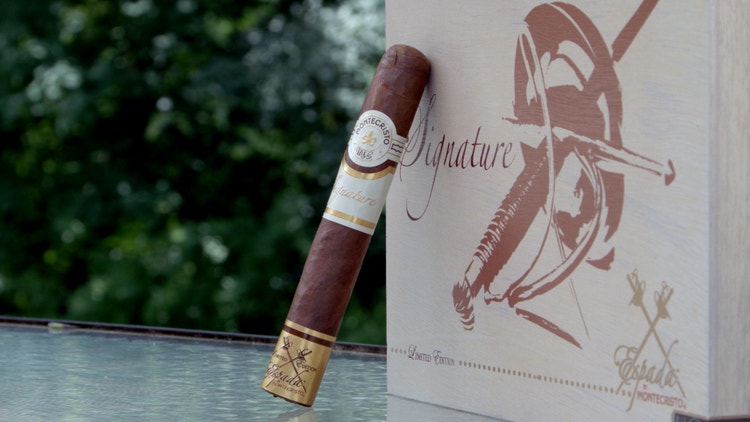 cigar advisor #nowsmoking cigar review montecristo espada signature - setup shot of cigar leaning against box