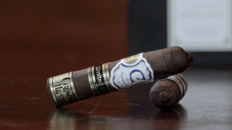 cigar advisor #nowsmoking cigar revuew le careme pastelitos 2023 - setup of cigars resting on wooden table