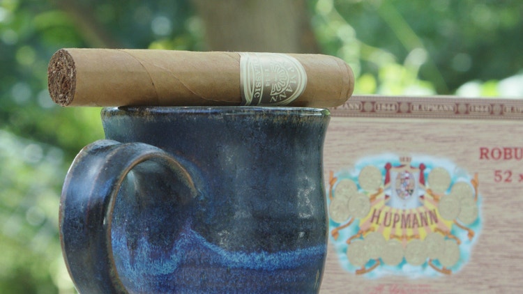 h upmann classic 1844 robusto #NowSmoking cigar on top of a coffee mug