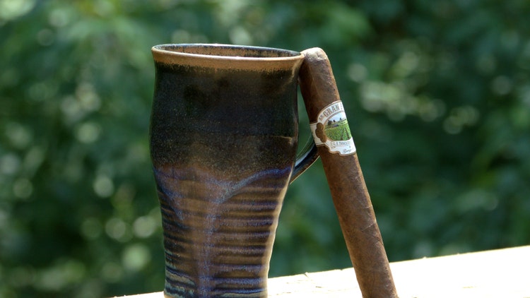 Gran Habano La Gran Fuma Gran Robusto cigar with a cup of coffee