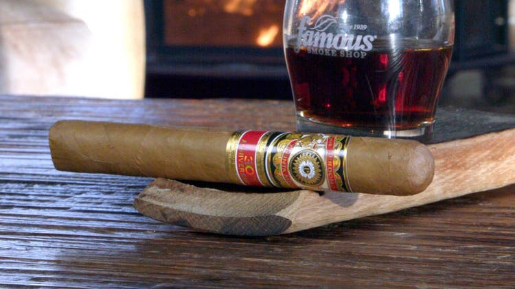 cigar advisor my weekend cigar review perdomo 30th anniversary connecticut - setup shot of cigar with glass or bourbon in the background