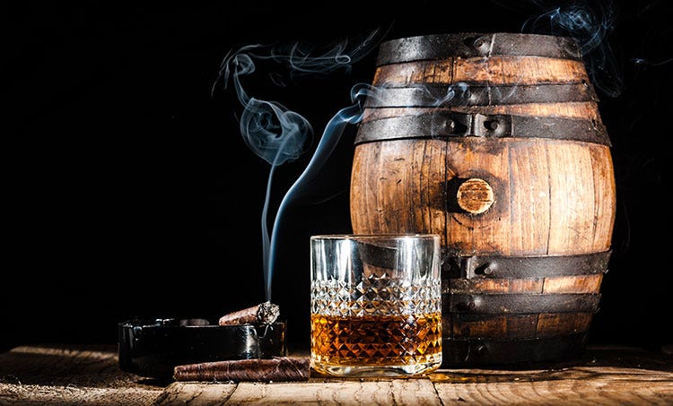 Top 10 best cigars for pairing with rum - rum and cigars - aging barrel