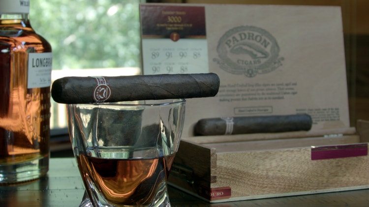 padron 3000 maduro on a rocks glass with whiskey in front of its box from #nowsmoking cigar review