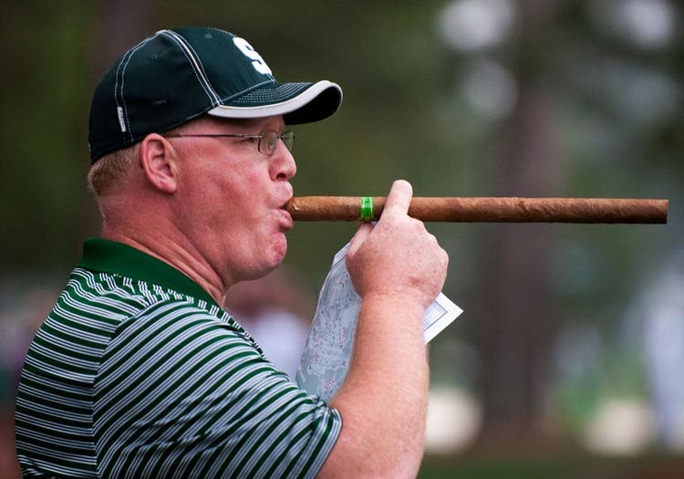 golfer with long cigar