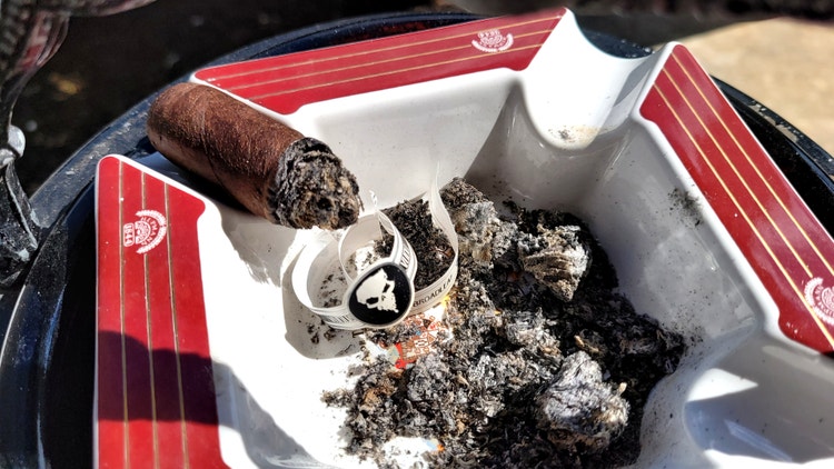 J Fuego Vudu Broadleaf cigar review summary with nub of the cigar in an ashtray