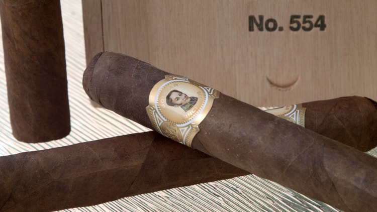 Bolivar Cofradia Churchill cigars on table